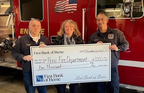 FIRST BANK OF BERNE DONATES TO THE PERU FIRE DEPARTMENT