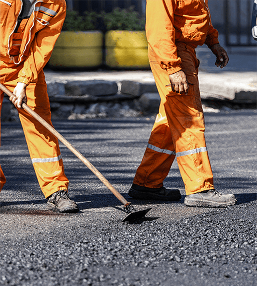 Construction Works Laying Asphalt
