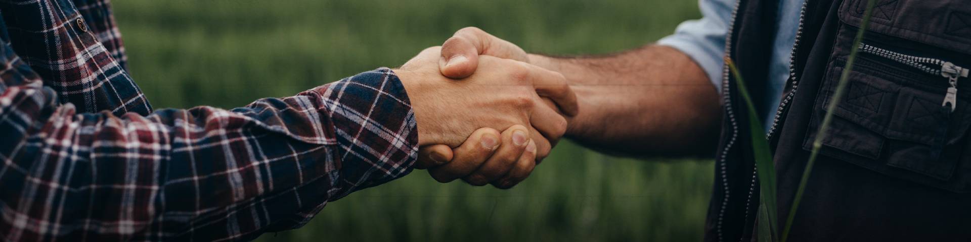 Hero-Farmers-in-Field-Shaking-Hands